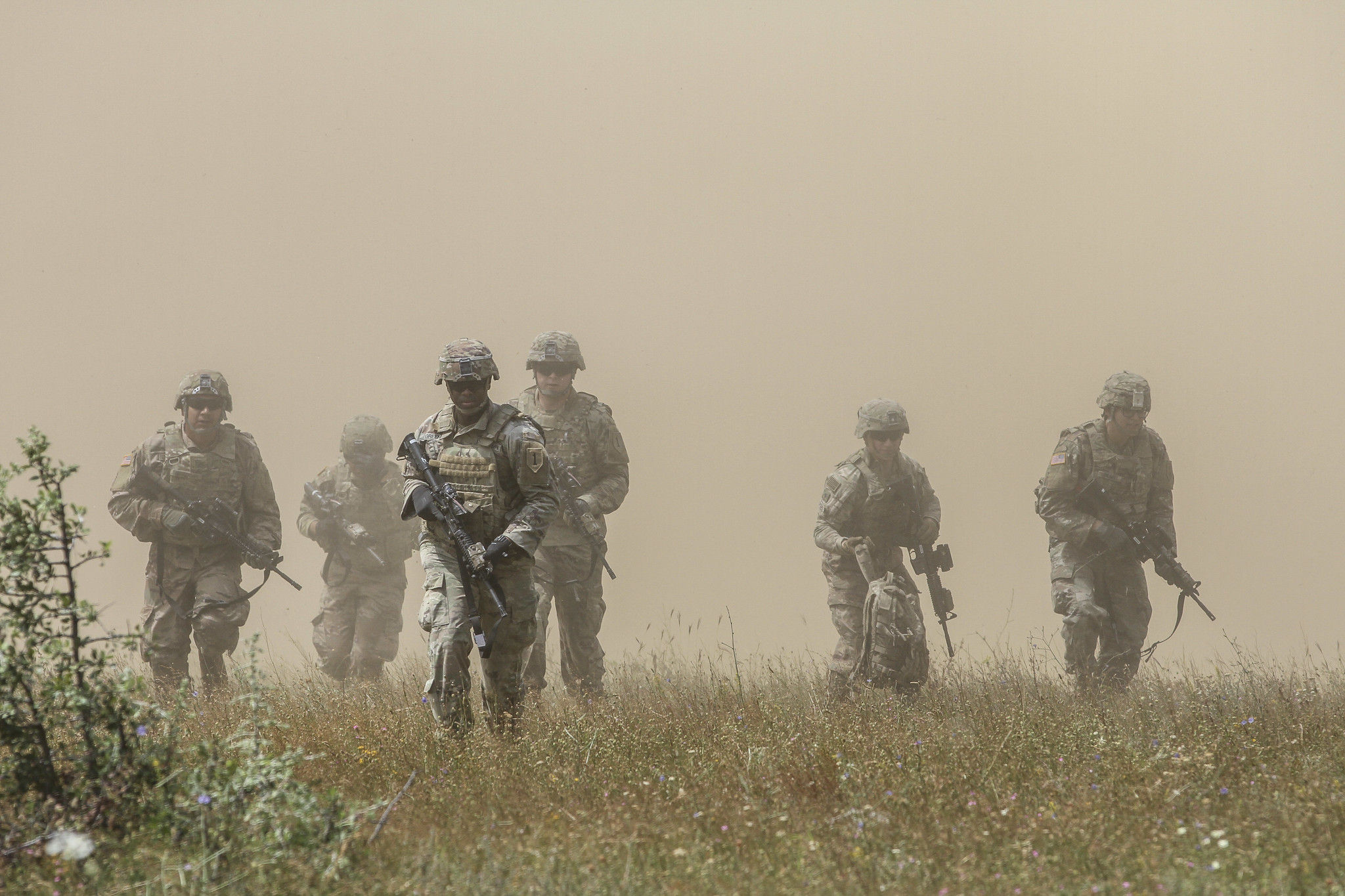 Cavalry scouts maneuver toward cover after an air assault during Platinum Lion 19 at Novo Selo Training Area in Bulgaria on July 9, 2019. (Staff Sgt. True Thao/Army)