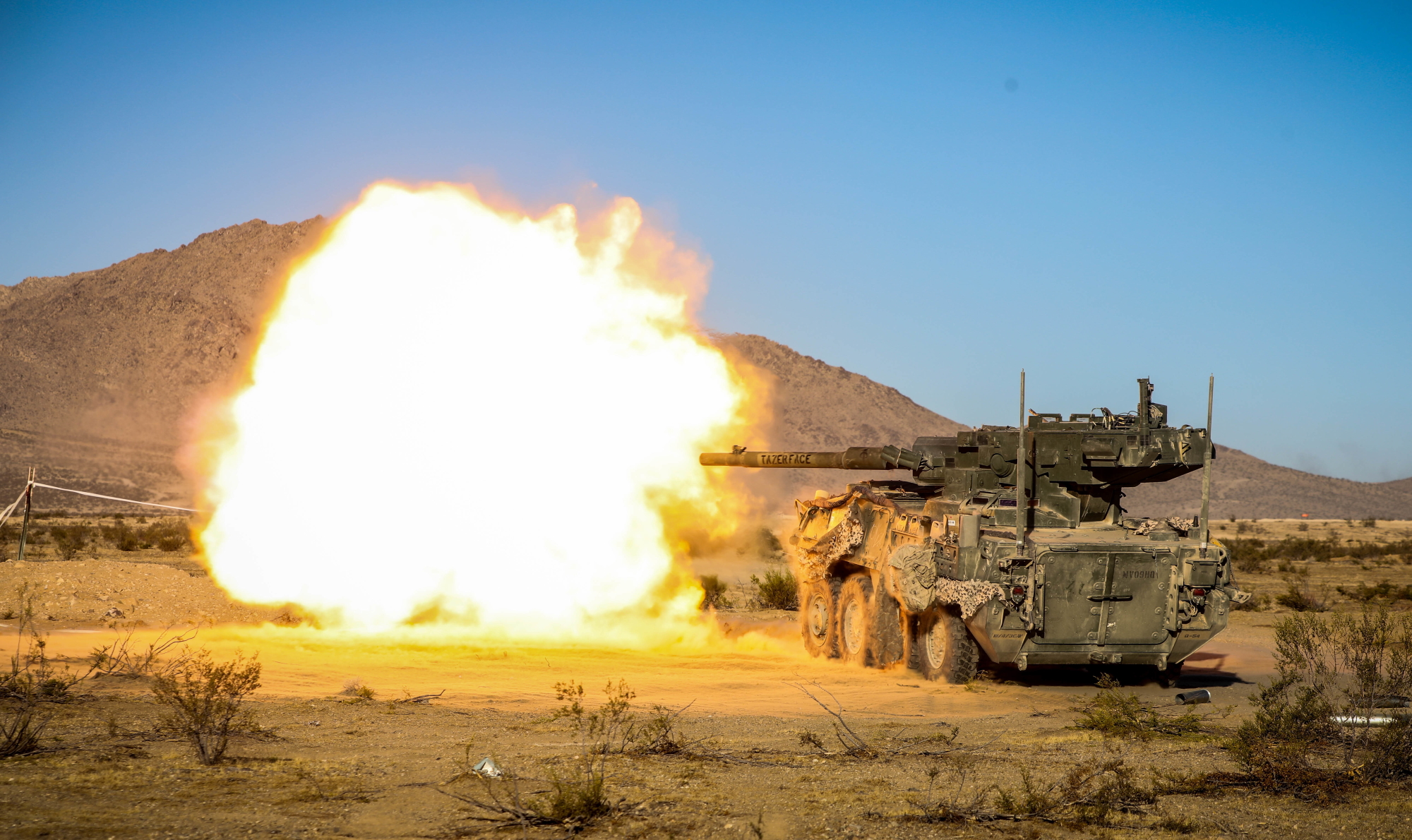 The M1128 Stryker Mobile Gun System assigned to Fort Hood engages simulated enemy targets during live-fire training Nov. 8, 2019, during Decisive Action Rotation 20-02 at the National Training Center in Fort Irwin, Calif. (Spc. Kyler Chatman/Army)