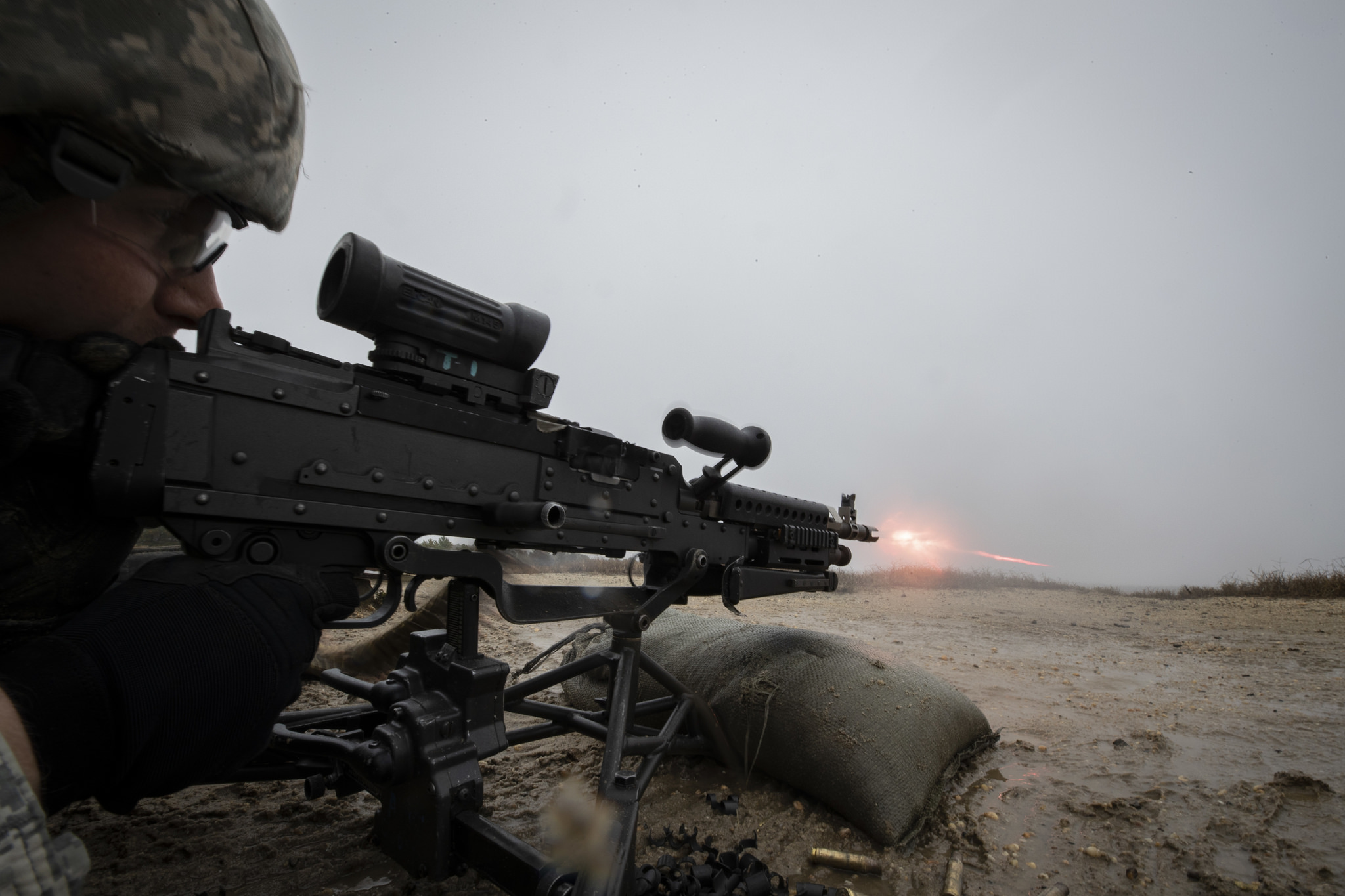Army Cpl. Brandon Chadwick, of the New Jersey National Guard, fires the M240 machine gun during weapons training on Joint Base McGuire-Dix-Lakehurst, N.J., Nov. 6, 2018. (Master Sgt. Matt Hecht/Air National Guard)