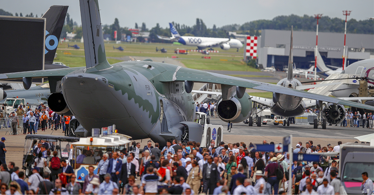 Visitors walk around at the Paris Air Show in Le Bourget, northeast of Paris, France, on June 18, 2019. The world's aviation elite gathered at the event as safety concerns lingered after two crashes of the Boeing 737 Max. (Francois Mori/AP)