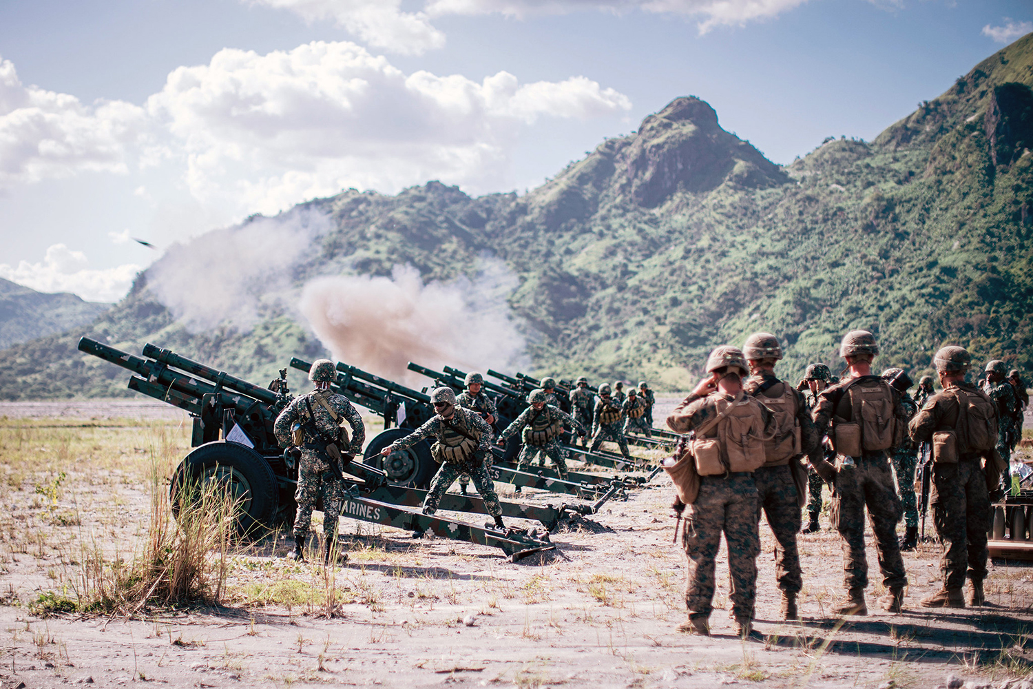 U.S. Marines observe Philippine Marines fire M102 105 mm howitzers during exercise KAMANDAG 3 at Colonel Ernesto Ravina Air Base, Philippines, Oct. 15, 2019. (Staff Sgt. Donald Holbert/Marine Corps)