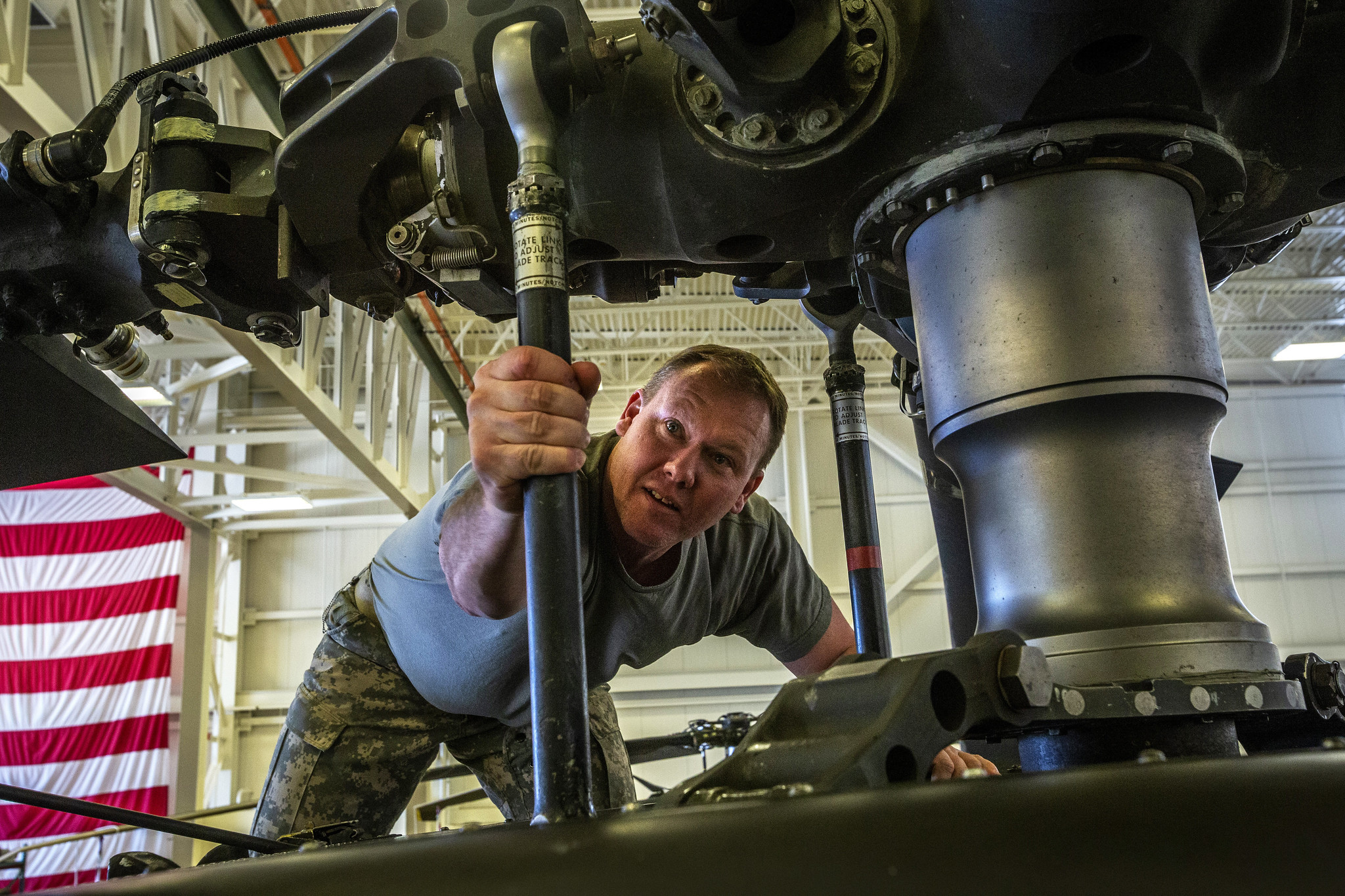 Chief Warrant Officer 3 Charles E. Fisher, a UH-60L Black Hawk helicopter pilot with the New Jersey Army National Guard, performs a final check April 17, 2019, during maintenance at the Army Aviation Support Facility at Joint Base McGuire-Dix-Lakehurst, N.J. (Mark C. Olsen/Army National Guard )