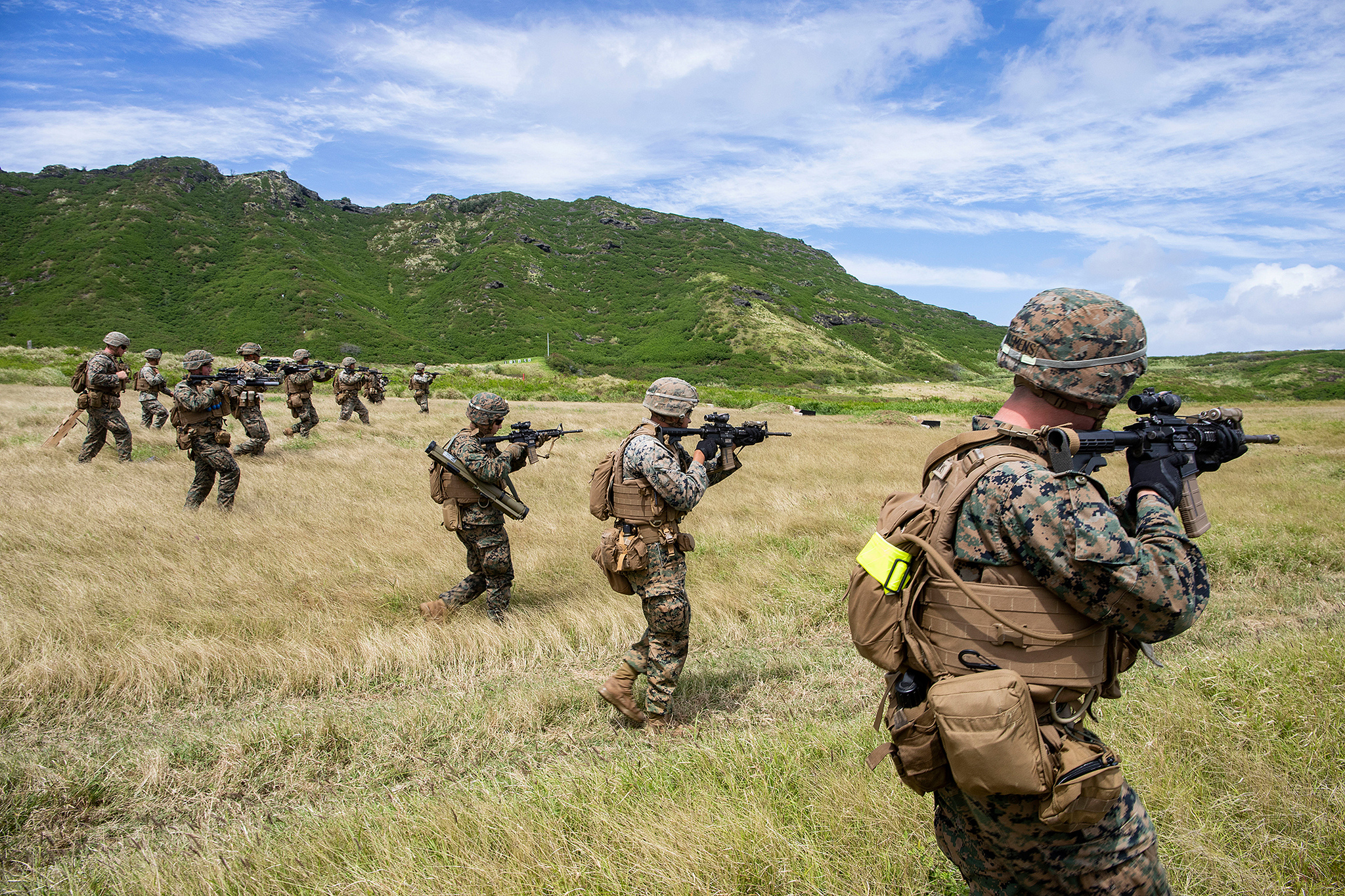 Marines advance toward targets on March 6, 2019, during a squad supported attack at the Kaneohe Bay Range Training Facility, Marine Corps Base Hawaii. (Sgt. Jesus Sepulveda Torres/Marine Corps)