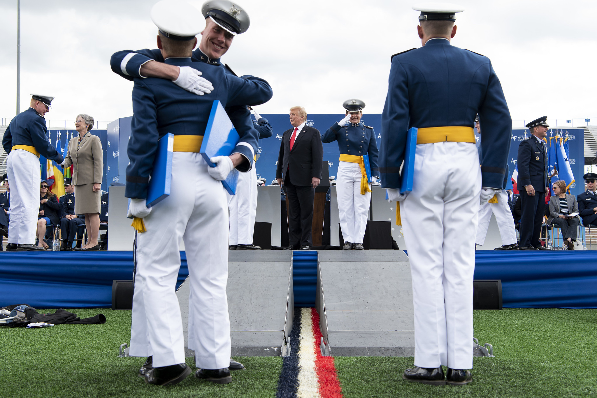 President Donald Trump congratulates cadets at the U.S. Air Force Academy graduation at Falcon Stadium in Colorado Springs, Colo., May 30, 2019. Nine-hundred-eighty-nine cadets graduated to become the newest 2nd lieutenants in the Air Force. (Joshua Armstrong/Air Force)