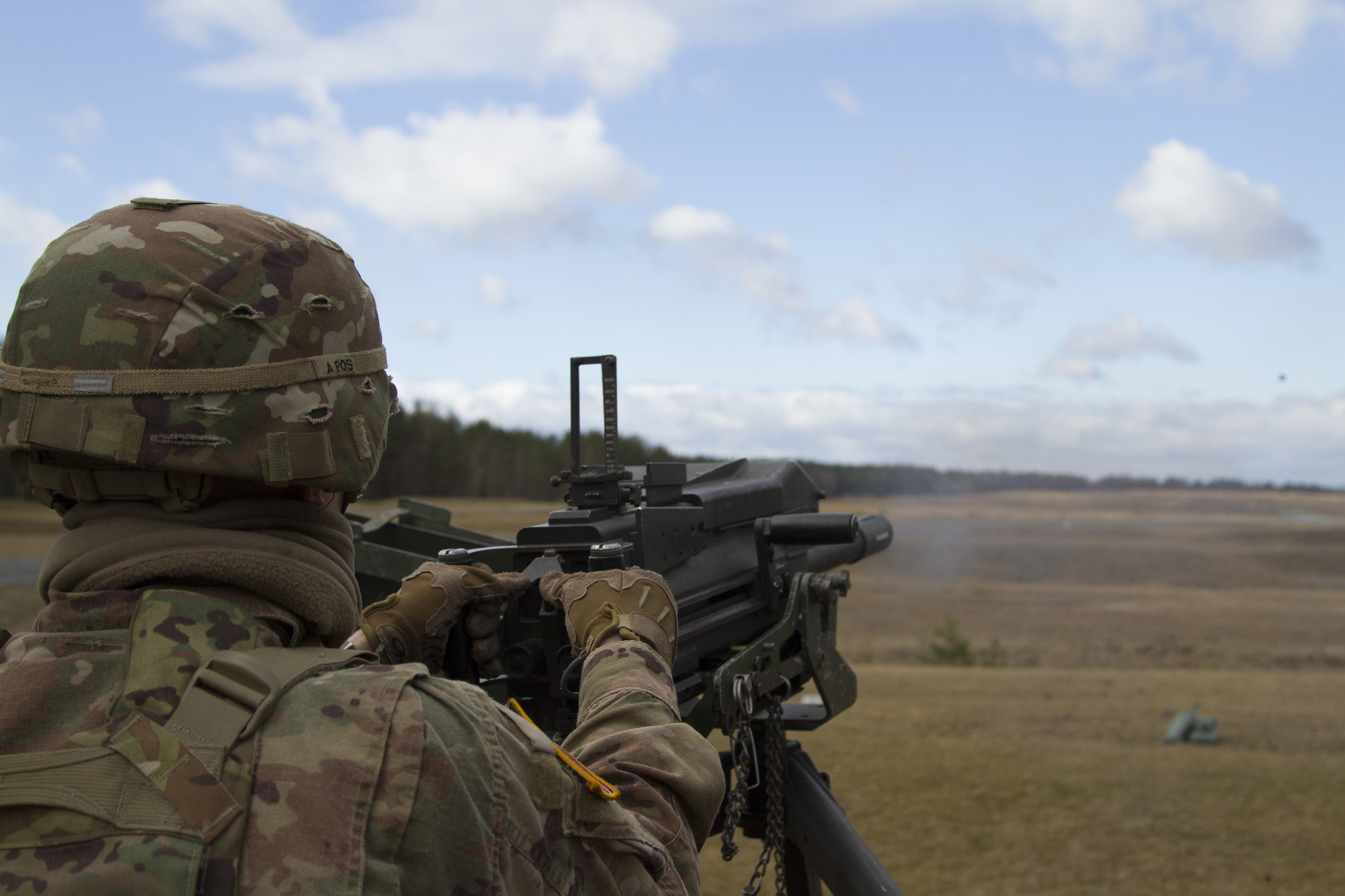 U.S. Army 1st Lt. Kevin A. Smith launches a grenade down range with the MK-19mm grenade machine gun March 13, 2019, at Grafenwoehr Training Area, Germany. (Spc. Yon Trimble/Army)